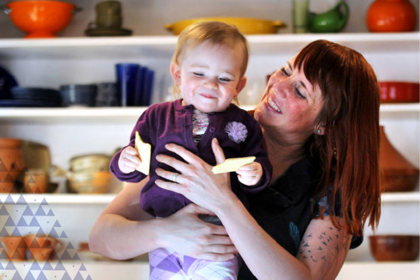 Image of woman holding child