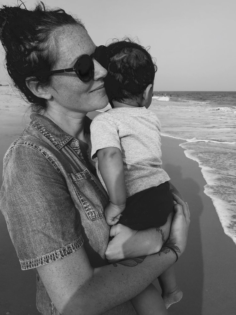 Mother (Sara) Holding her super cute baby.