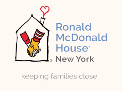 Logo Of Ronald McDonald House New York, Featuring A Stylized House With Hands Clasped In Solidarity And A Heart Symbol Above, Accompanied By The Slogan 'keeping Families Close.